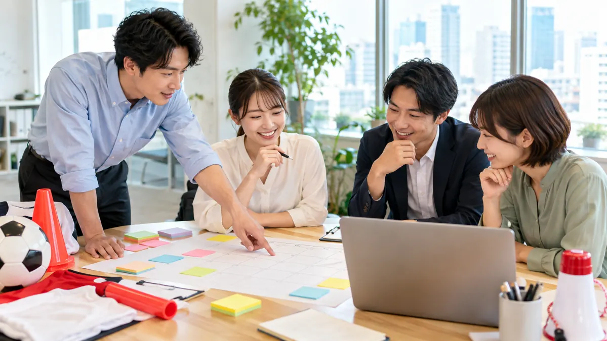 社内運動会の企画を打ち合わせる担当者のイメージ